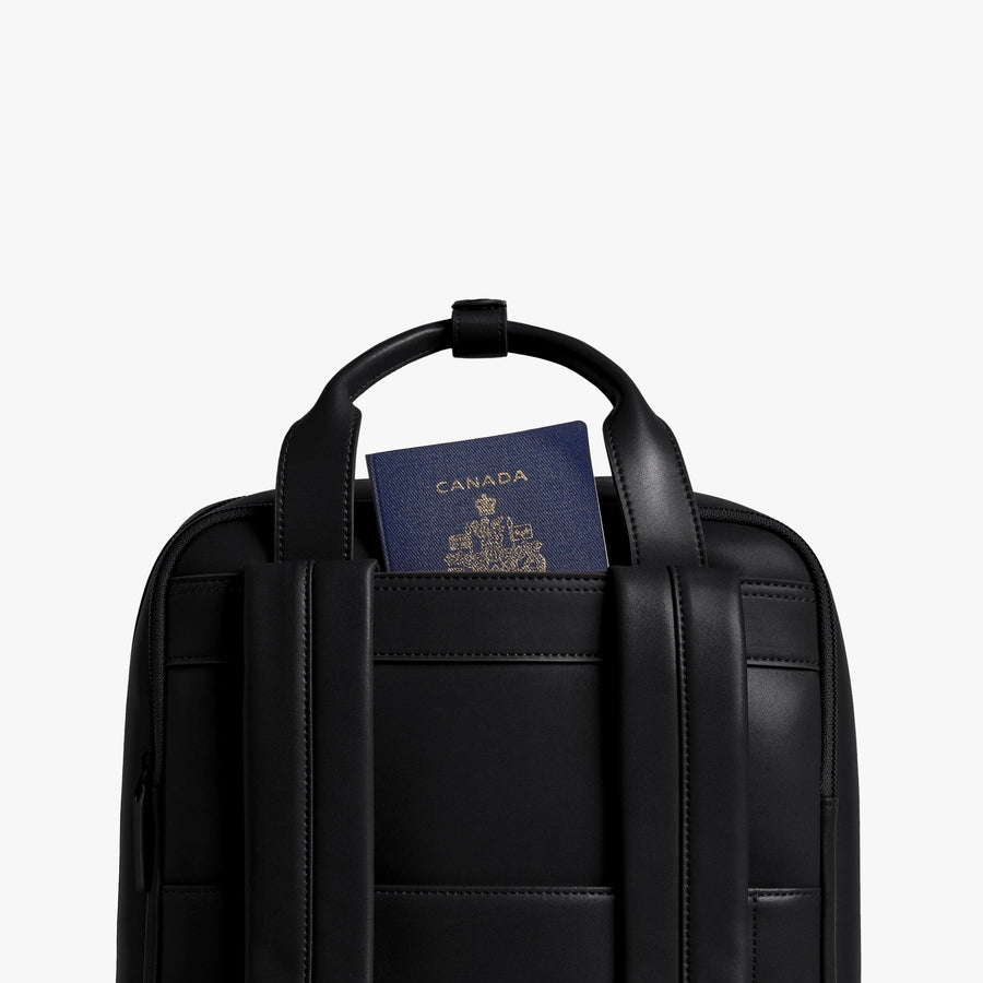 Carbon Black (Vegan Leather) | Handle view of Metro Backpack Carbon Black
