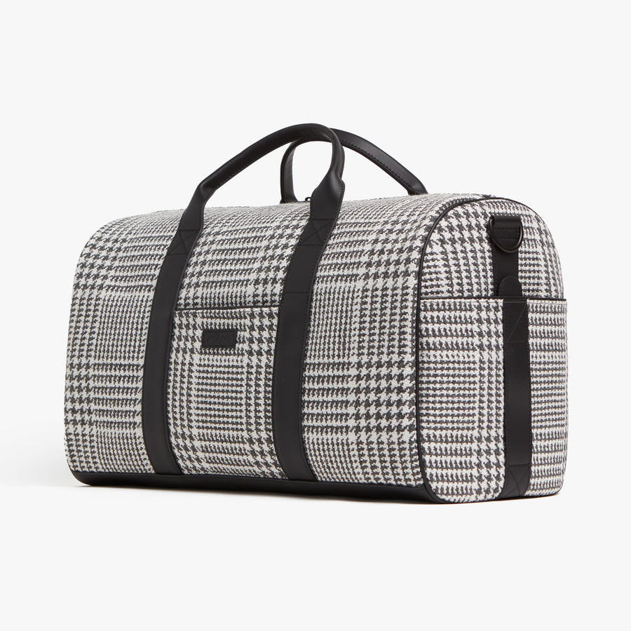 Houndstooth Check | Angled view of Metro Carry-All Duffel in Houndstooth Check