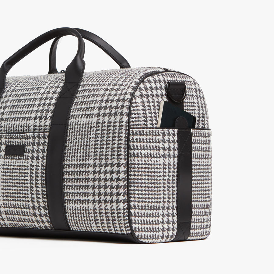 Houndstooth Check | Angled view of Metro Carry-All Duffel in Houndstooth Check