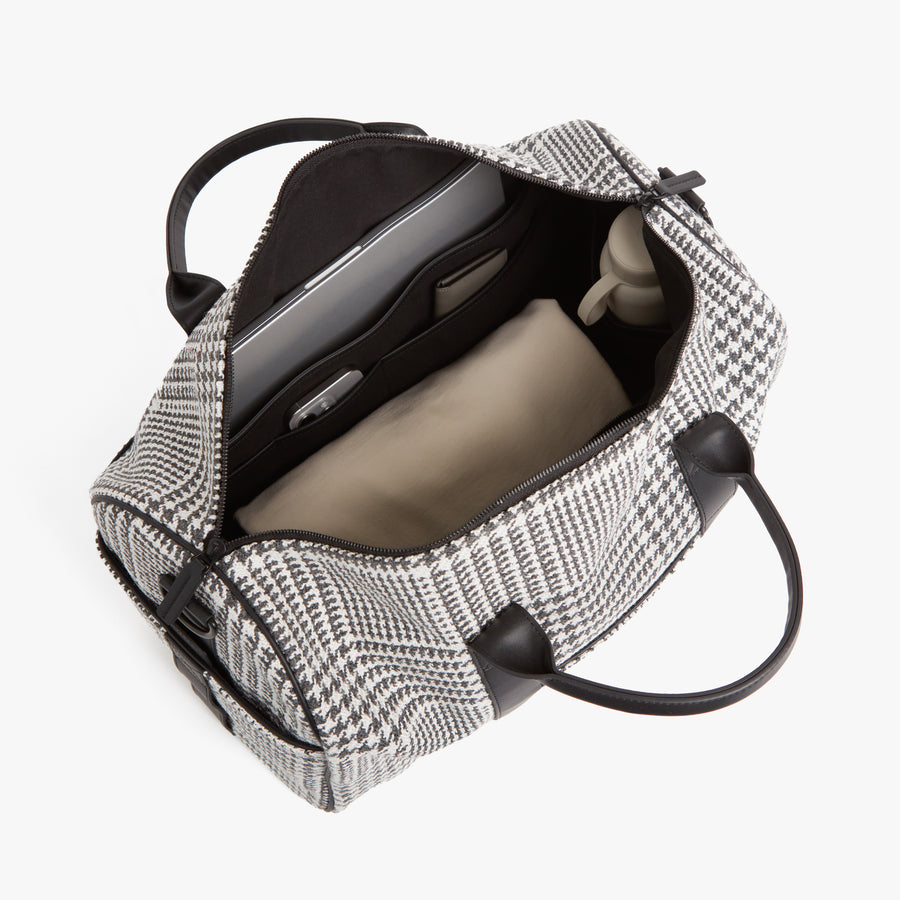 Houndstooth Check | Angled view of Metro Carry-All Duffel in Houndstooth Check
