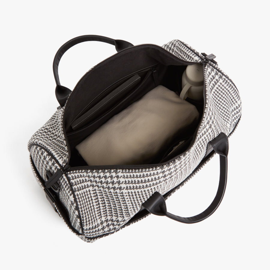 Houndstooth Check | Angled view of Metro Carry-All Duffel in Houndstooth Check
