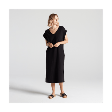 Full body front view of woman in Sevilla Dress Black