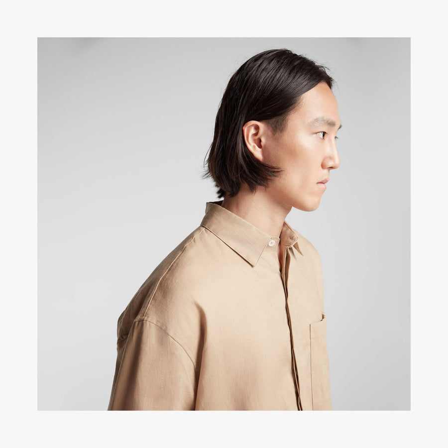 Cliff Stone | Shoulder view of man in Algarve Shirt in Cliff Stone