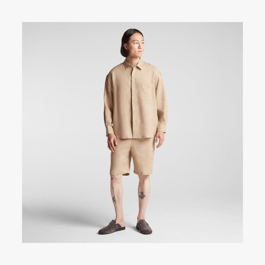 Cliff Stone | Full body front view of man in Algarve Shirt in Cliff Stone