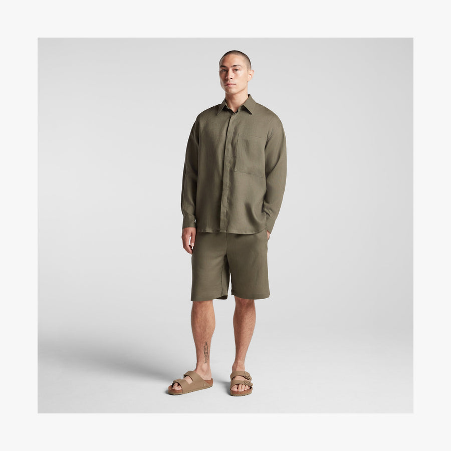 Dune Grass | Full body front view of man in Algarve Shirt in Dune Grass