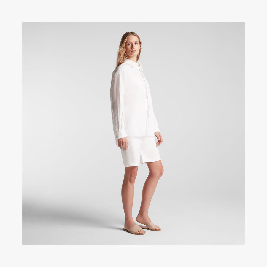 White | Full body side view of woman in Algarve Shirt in White