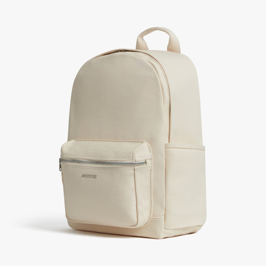 Ecru | Angled view of Gesso Backpack in Ecru
