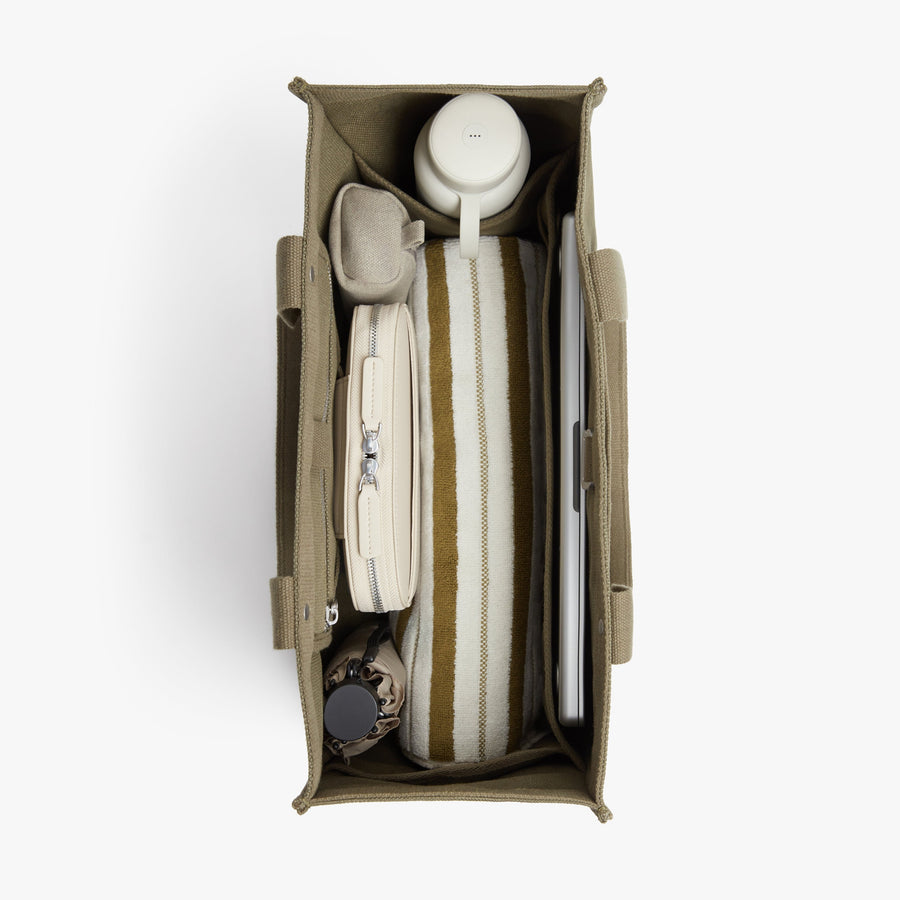 Moss | Interior view of Gesso Tote in Moss with folio kit and water bottle