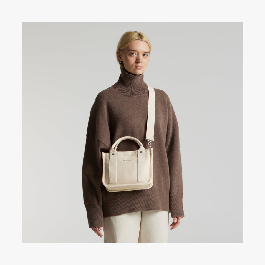 Ecru | Front view of Gesso Small Tote in Ecru with shoulder strap
