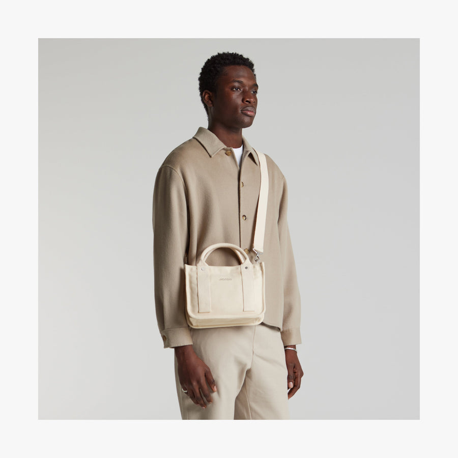 Ecru | Front view of Gesso Small Tote in Ecru with shoulder strap