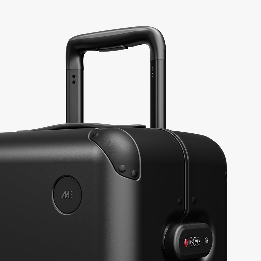 Obsidian | Luggage handle view of Hybrid Carry-On Plus in Obsidian