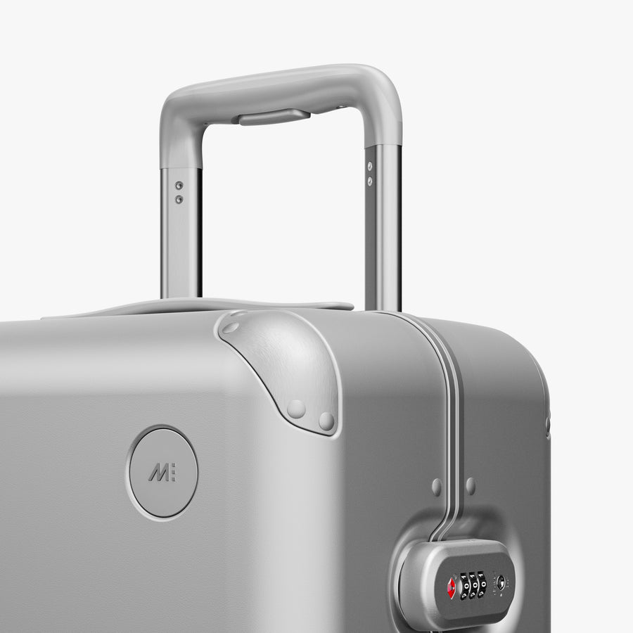 Silver | Luggage handle view of Hybrid Carry-On Plus in Silver