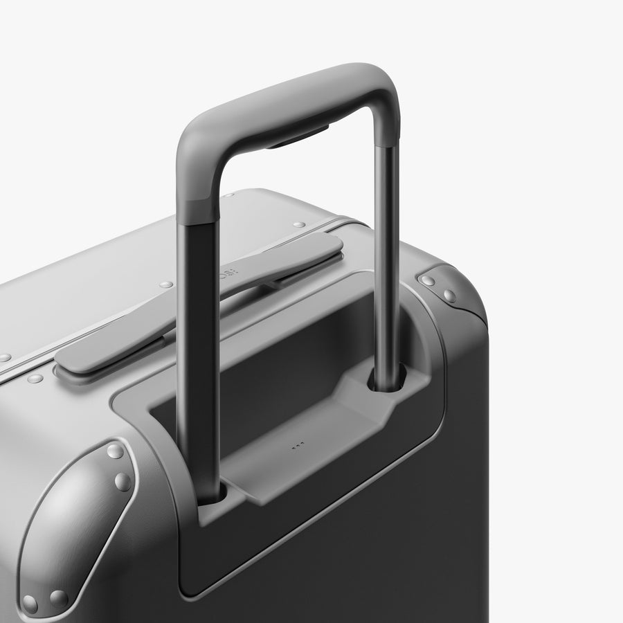 Silver | Extended luggage handle view of Hybrid Carry-On in Silver