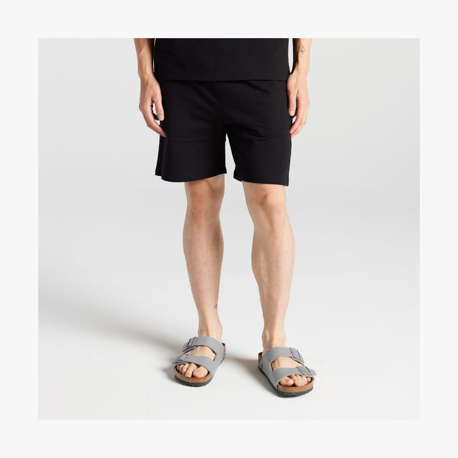 Black | Front view of man in Kyoto Shorts in Black