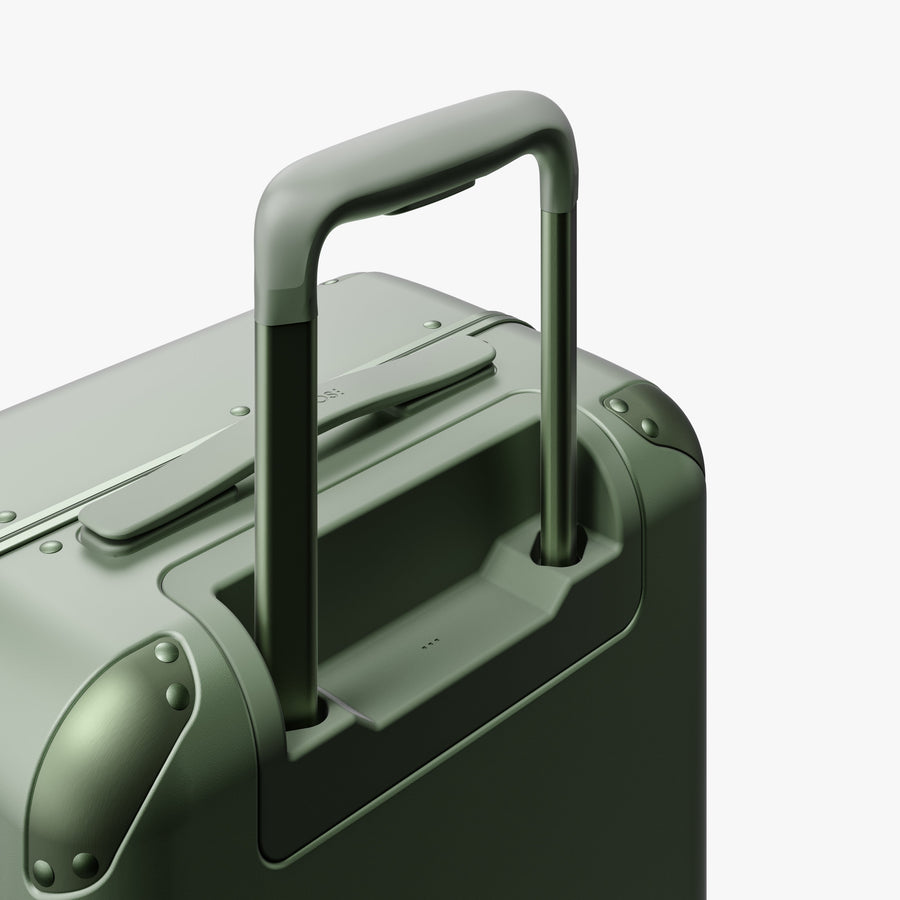Mint | Extended luggage handle view of Hybrid Carry-On in Mint