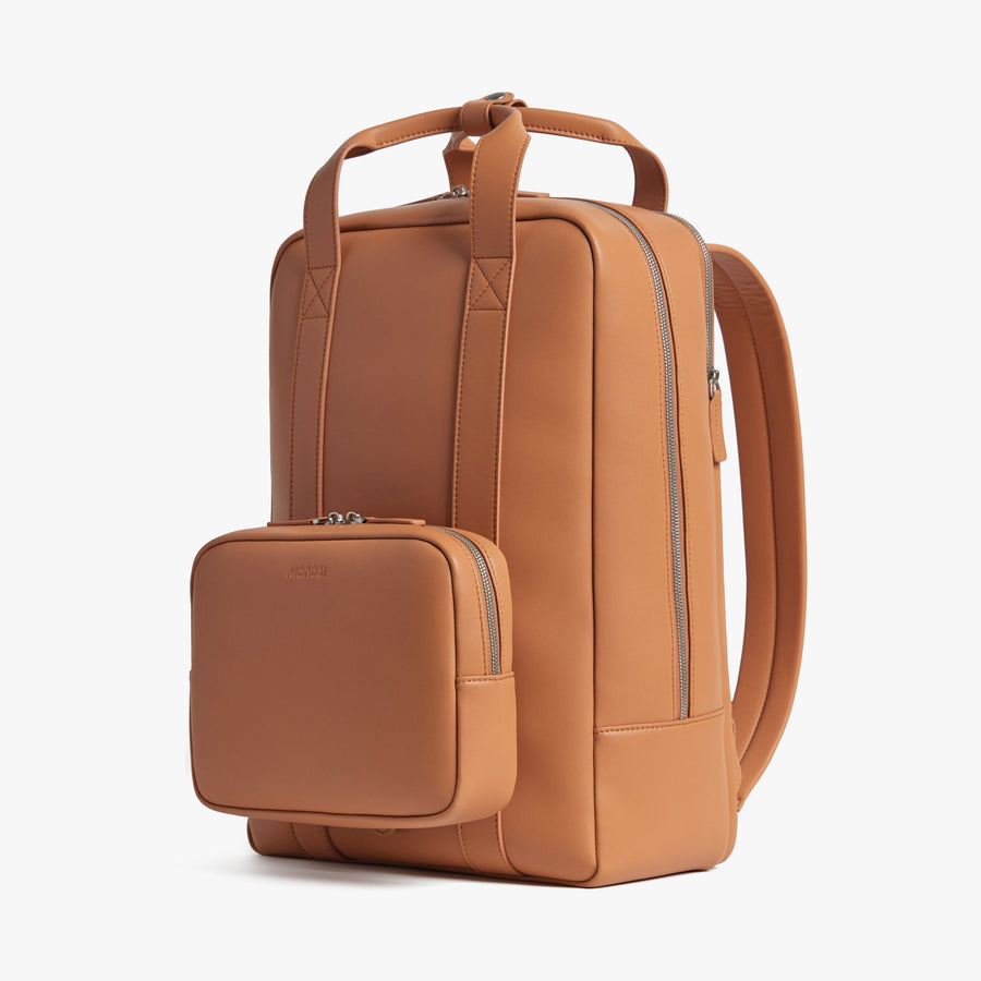 Saddle Tan (Vegan Leather) | Angled view of Metro Backpack in Saddle Tan
