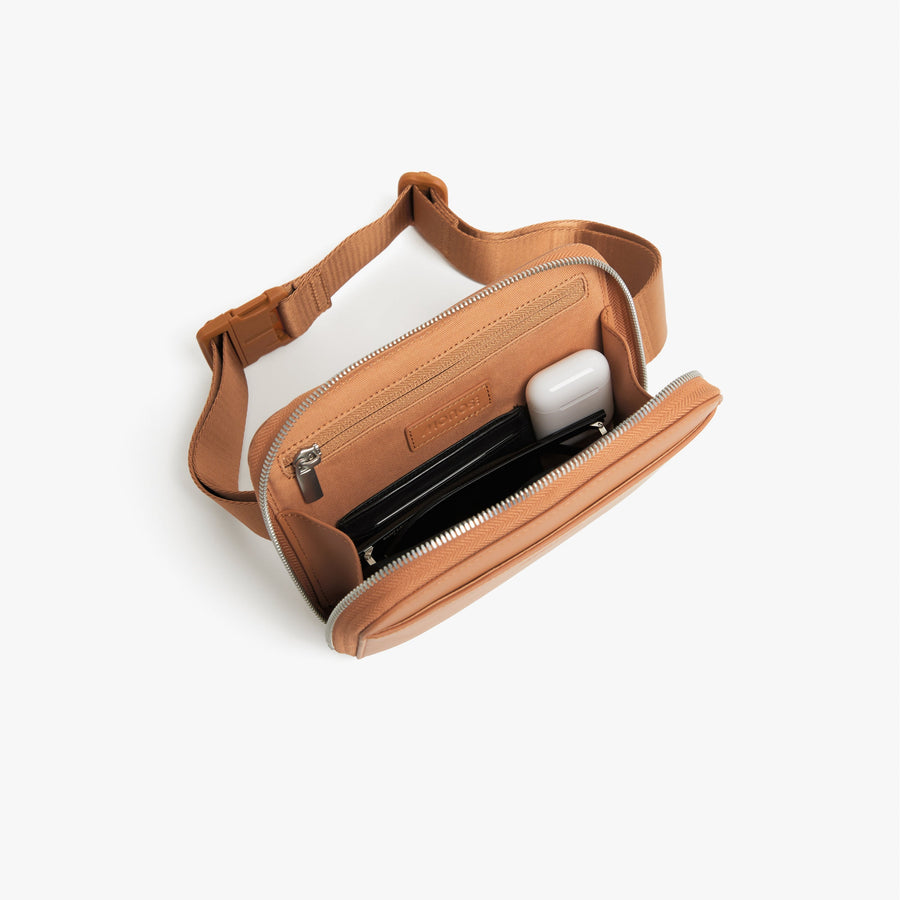 Saddle Tan (Vegan Leather) | Front full inside view of Metro Belt Bag in Saddle Tan