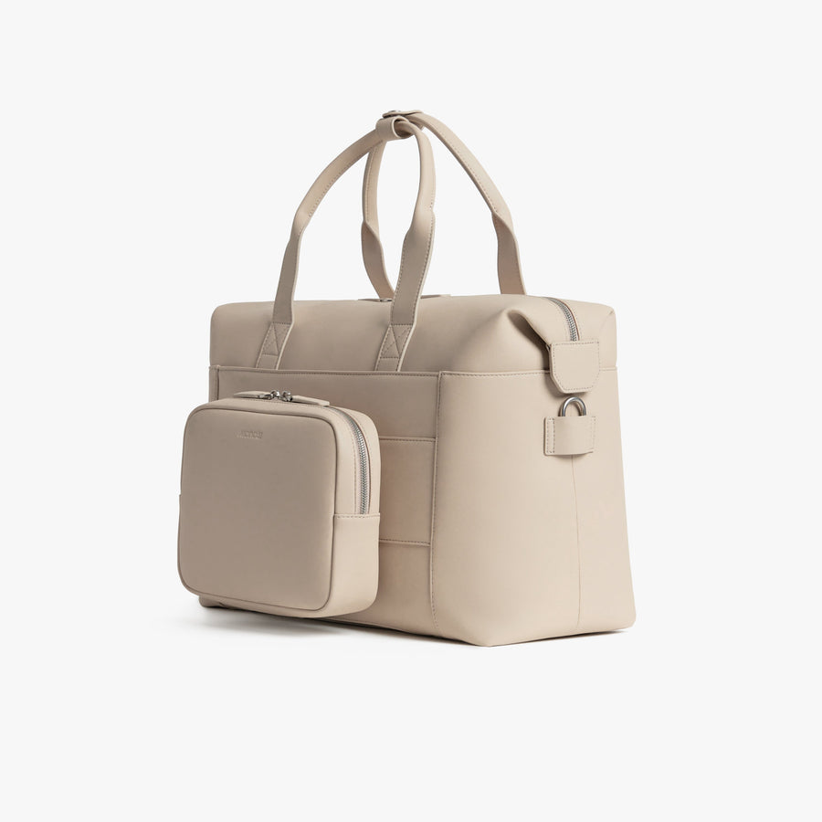 Ivory (Vegan Leather) | Angled view of Metro Duffel in Ivory