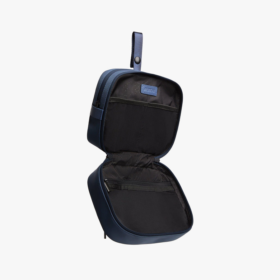 Oxford Blue | Open side view of Metro Hanging Toiletry Case in Oxford Blue