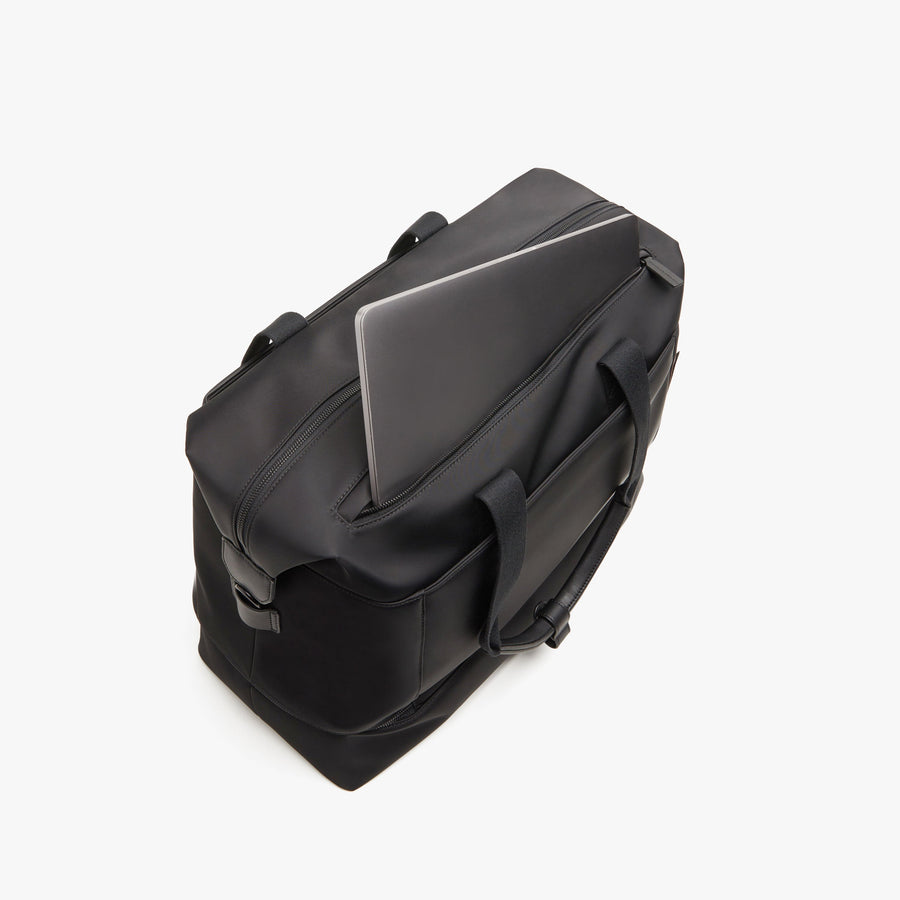 Carbon Black | Laptop sleeve view of Metro Weekender in Carbon Black