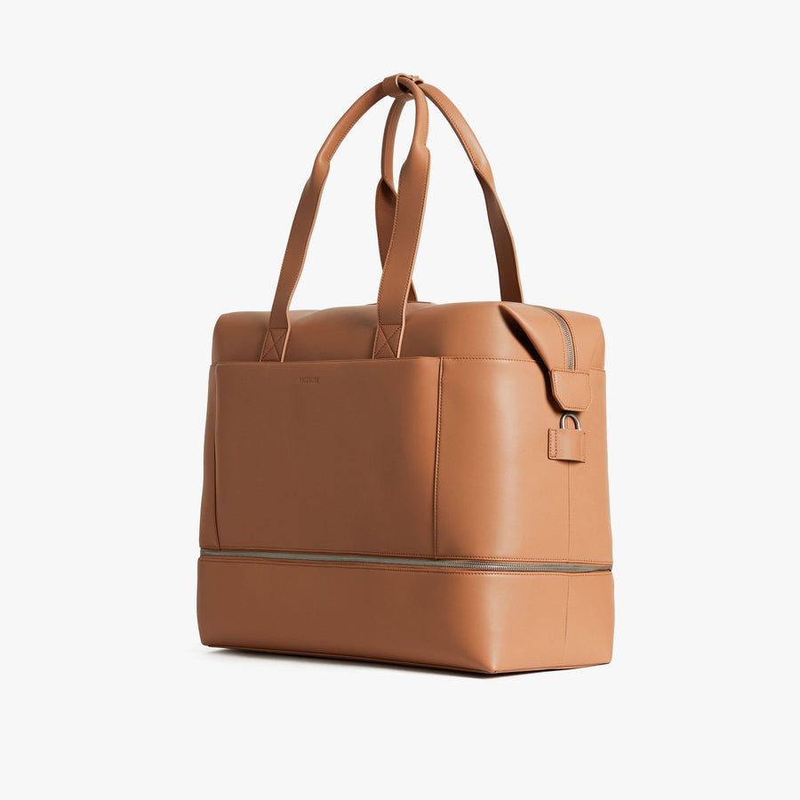 Saddle Tan (Vegan Leather) | Angled view of Metro Weekender in Saddle Tan