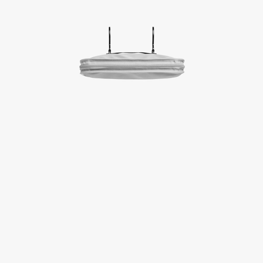 Grey | Front view empty of Metro Hanging Toiletry Case in Grey Unfolding