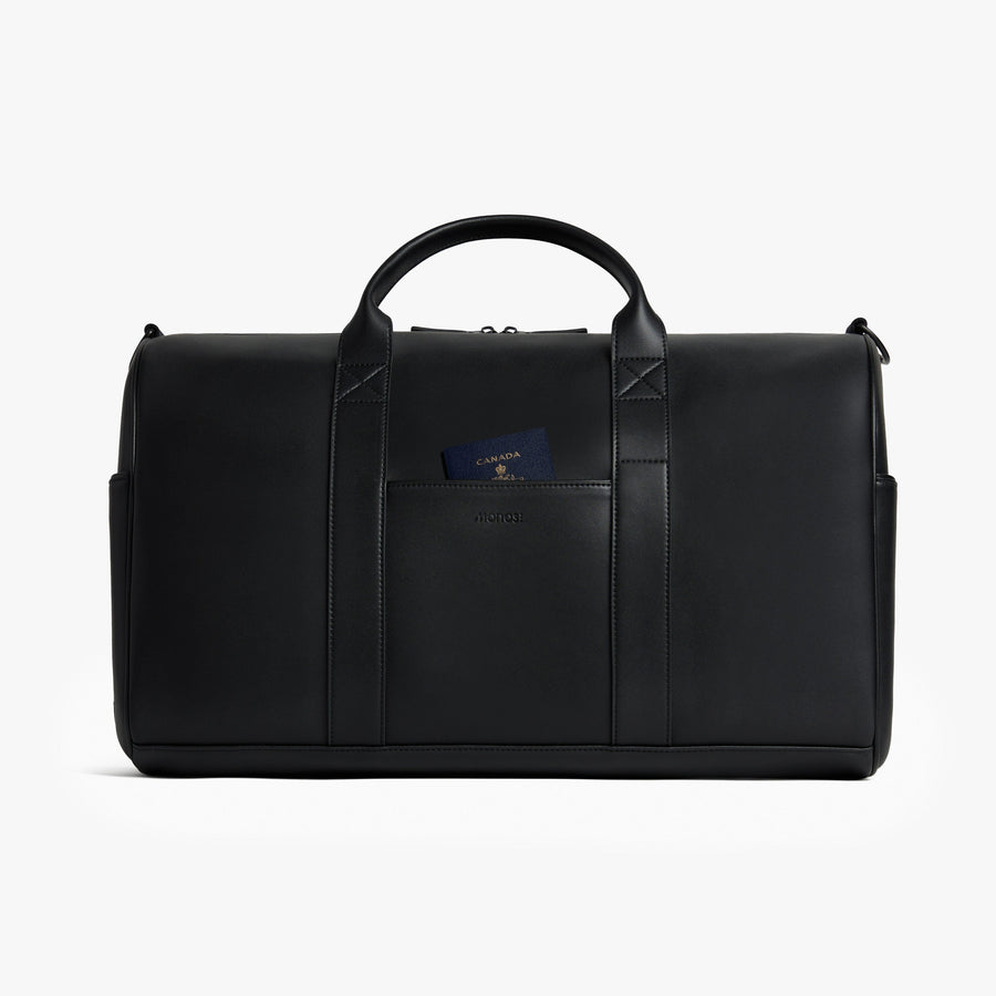 Carbon Black (Vegan Leather) | Front view of Metro Carry-All Duffel Carbon Black