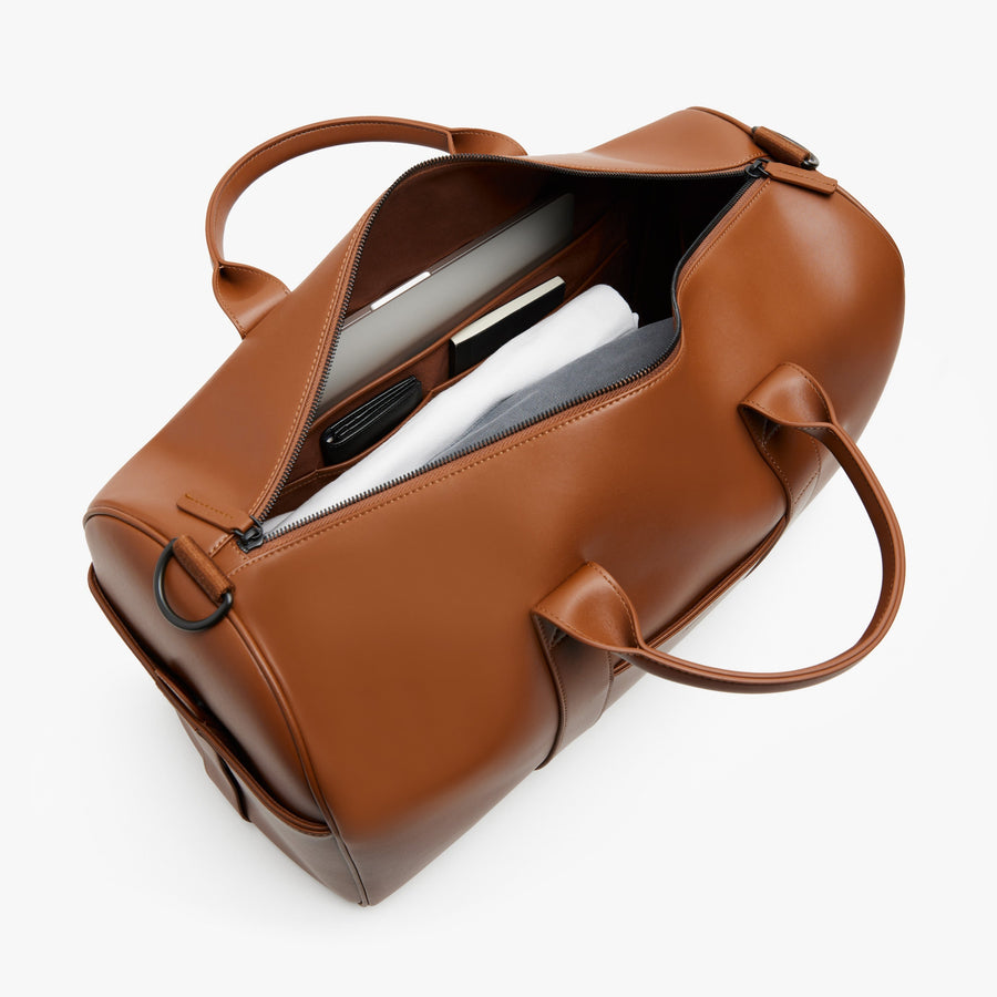 Mahogany (Vegan Leather) | Angled view of Metro Carry-All Duffel in Mahogany