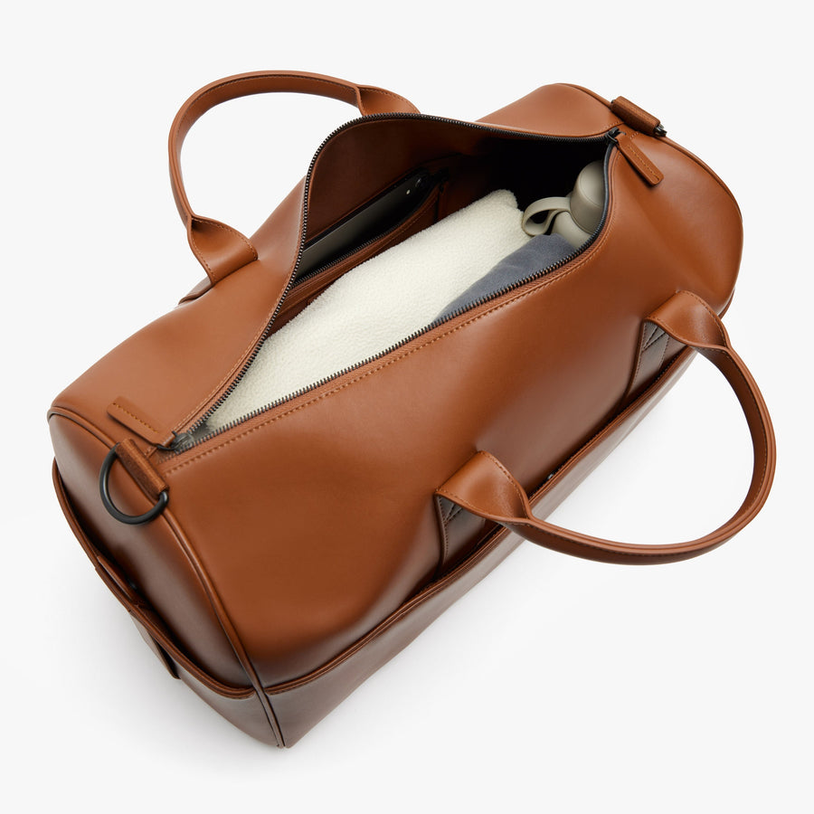 Mahogany (Vegan Leather) | Angled view of Metro Carry-All Duffel in Mahogany