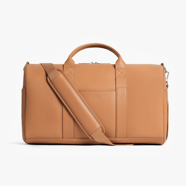 Saddle Tan (Vegan Leather) | Front view of Metro Carry-All Duffel Saddle Tan