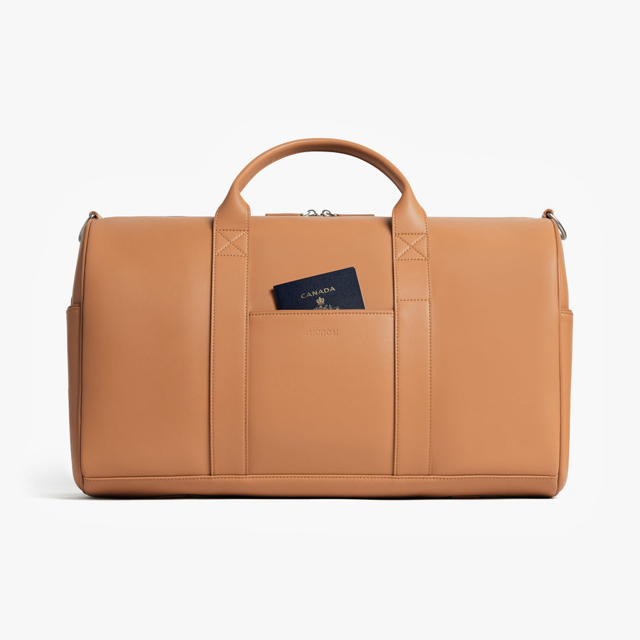Saddle Tan (Vegan Leather) | Front view of Metro Carry-All Duffel Saddle Tan
