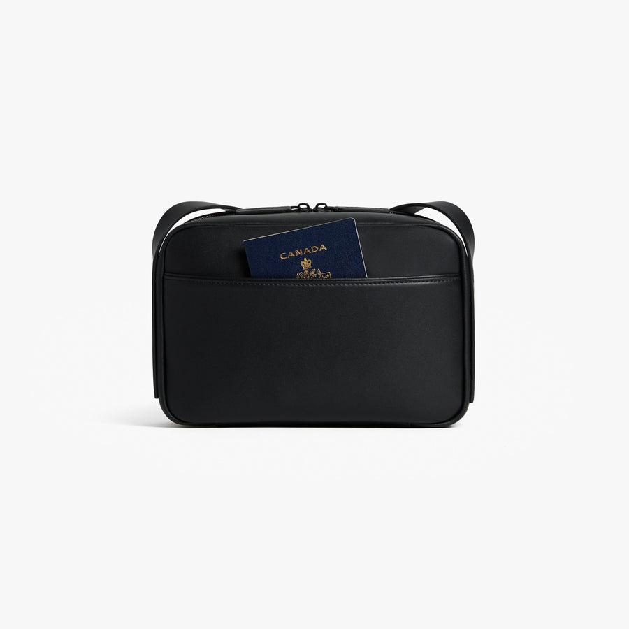 Carbon Black (Vegan Leather) | Back view of Metro Crossbody Carbon Black