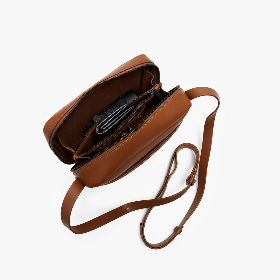Mahogany (Vegan Leather) | Angled view of Metro Crossbody in Mahogany