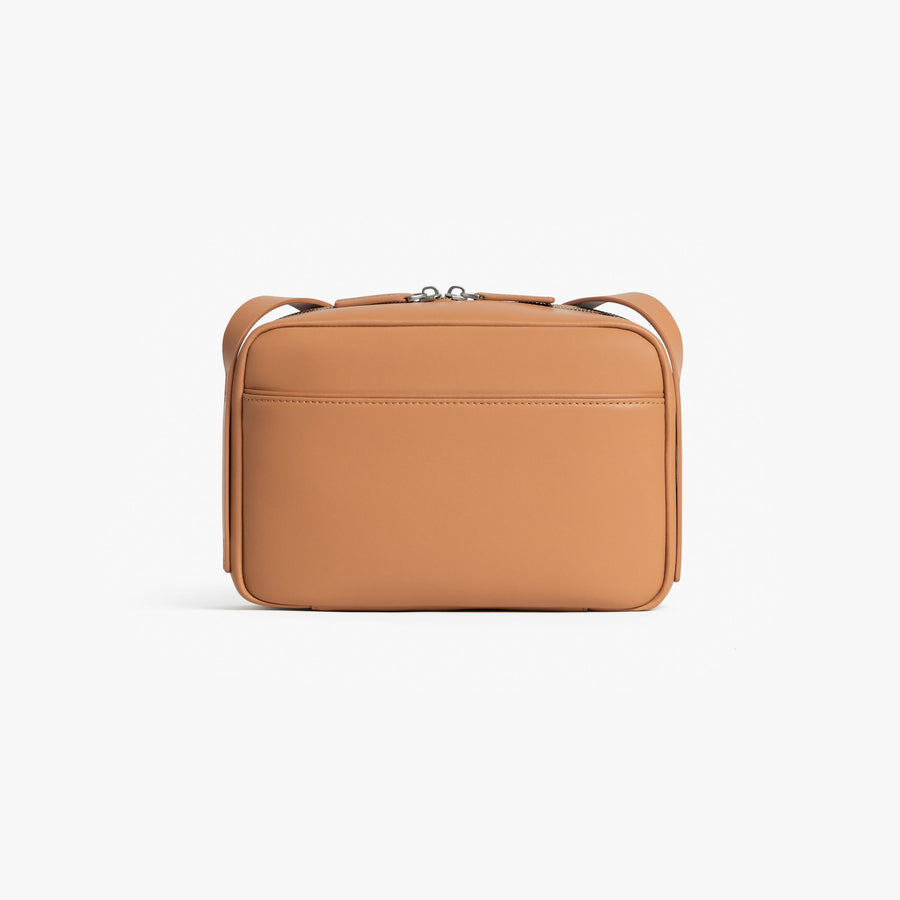 Saddle Tan (Vegan Leather) | Back view of Metro Crossbody Saddle Tan