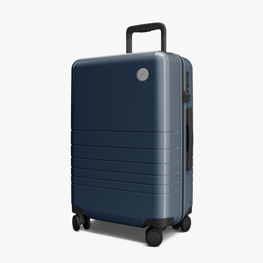 Arles Blue (Glossy) | Angled view of Carry-On Plus in Arles Blue