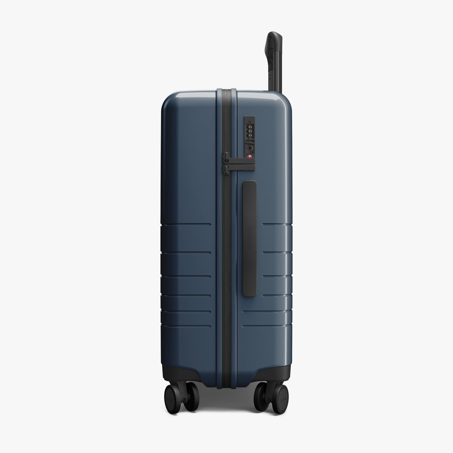 Arles Blue (Glossy) | Side view of Carry-On Plus in Arles Blue