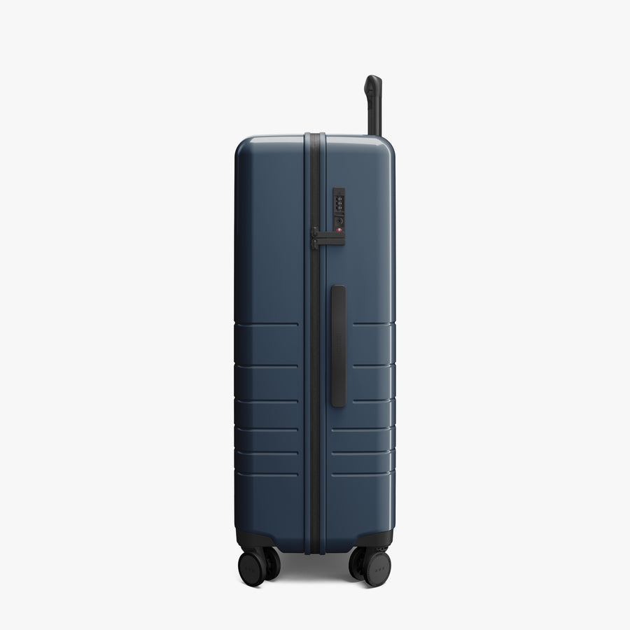 Arles Blue (Glossy) | Side view of Check-In Large in Arles Blue
