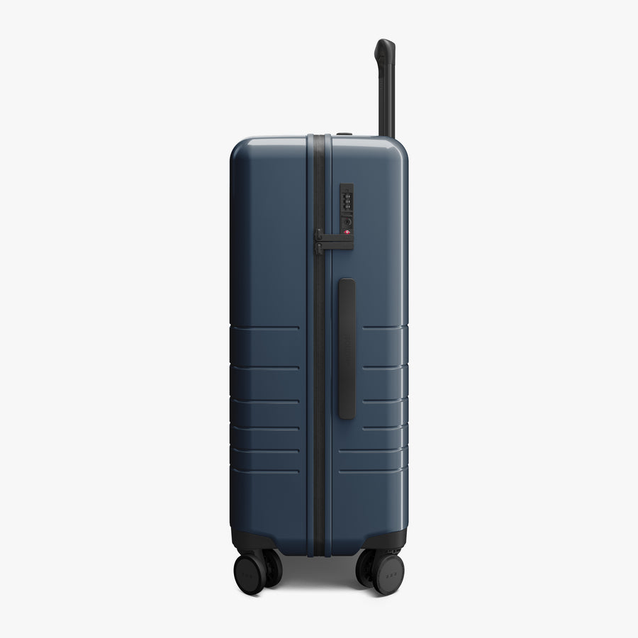 Arles Blue (Glossy) | Side view of Check-In Medium in Arles Blue
