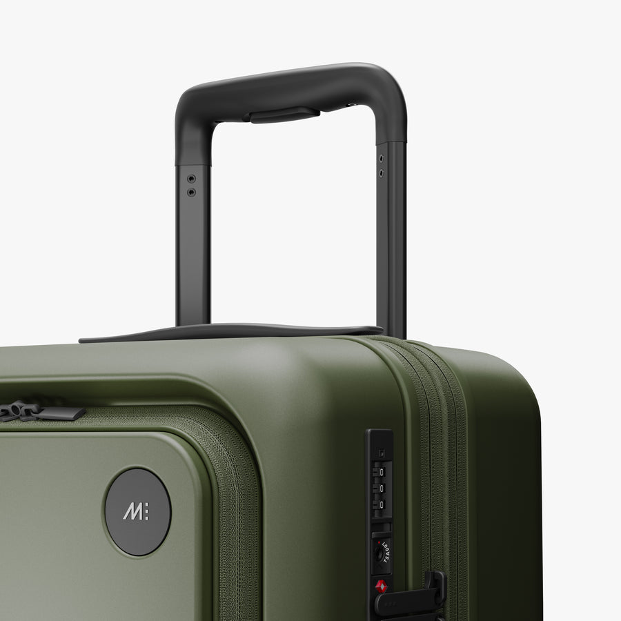 Olive Green | Luggage handle view of Expandable Carry-On Pro in Olive Green