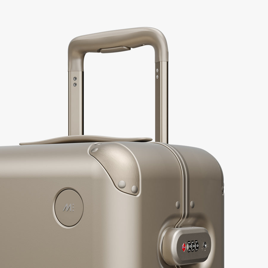 Champagne | Luggage handle view of Hybrid Carry-On in Champagne