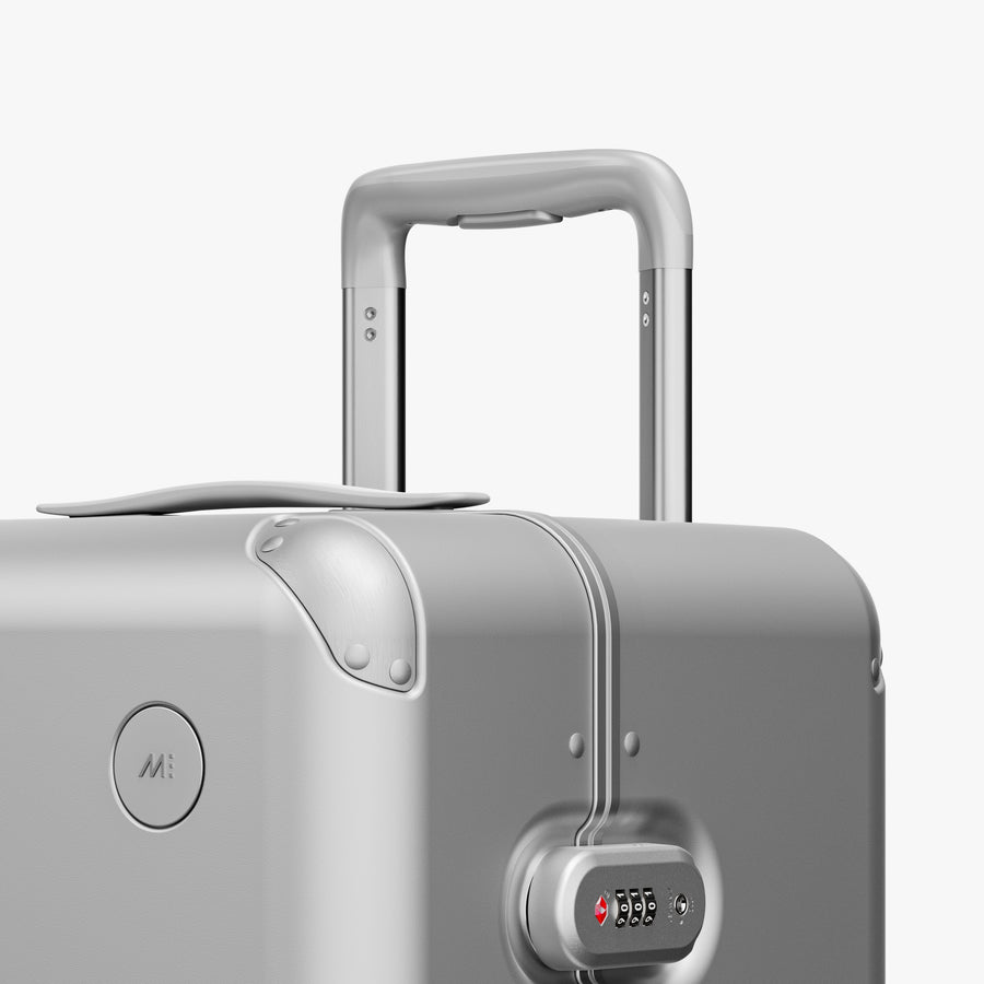 Silver | Luggage handle view of Hybrid Trunk Medium in Silver