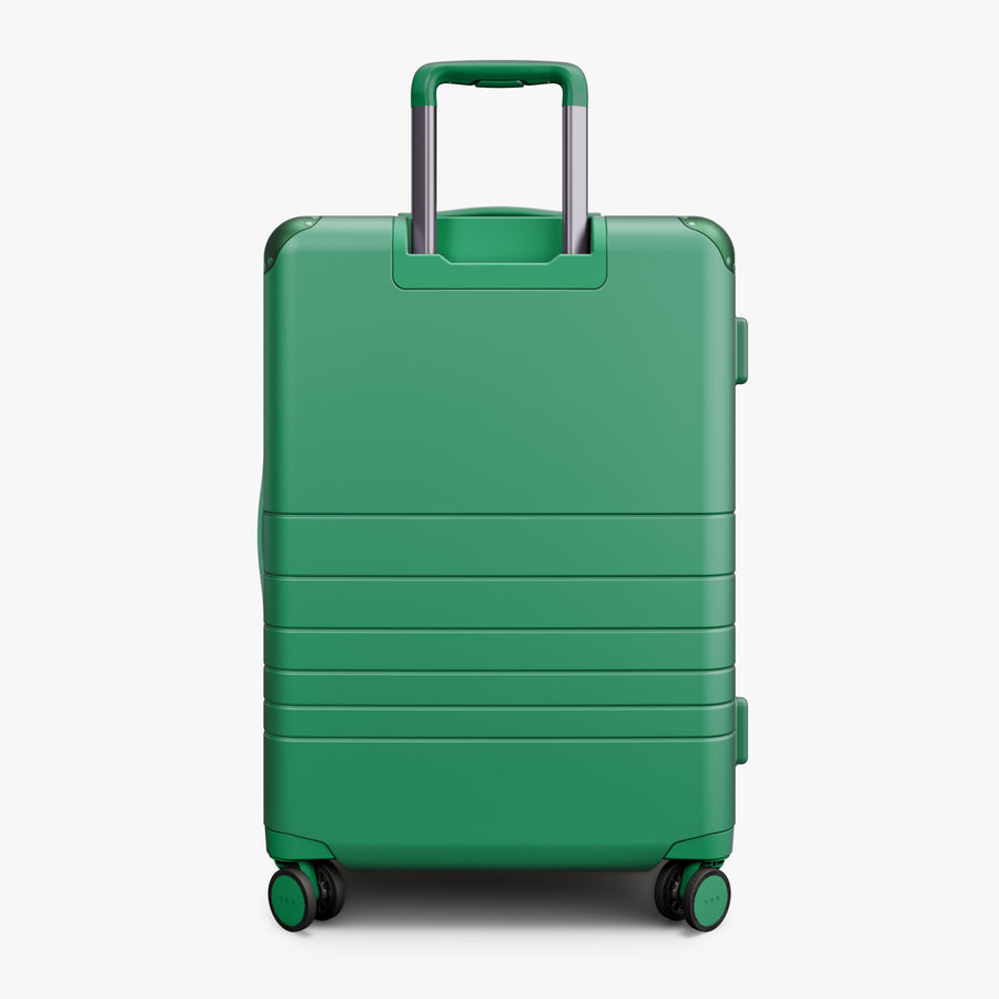 Jungle Green | Back view of the Hybrid Check-In Medium in Plus Jungle Green