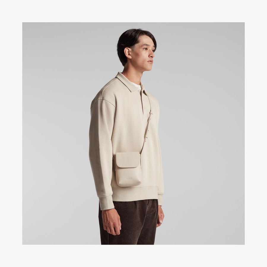 Ivory (Vegan Leather) | Angled view of Metro Mini Crossbody in Ivory