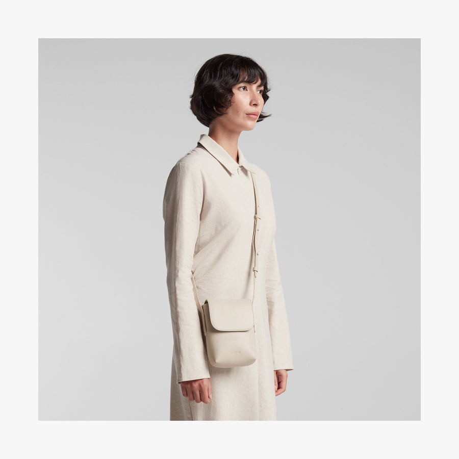 Ivory (Vegan Leather) | Angled view of Metro Mini Crossbody in Ivory