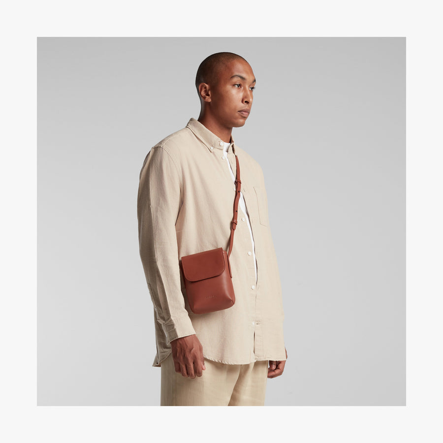 Mahogany (Vegan Leather) | Angled view of Metro Mini Crossbody in Mahogany