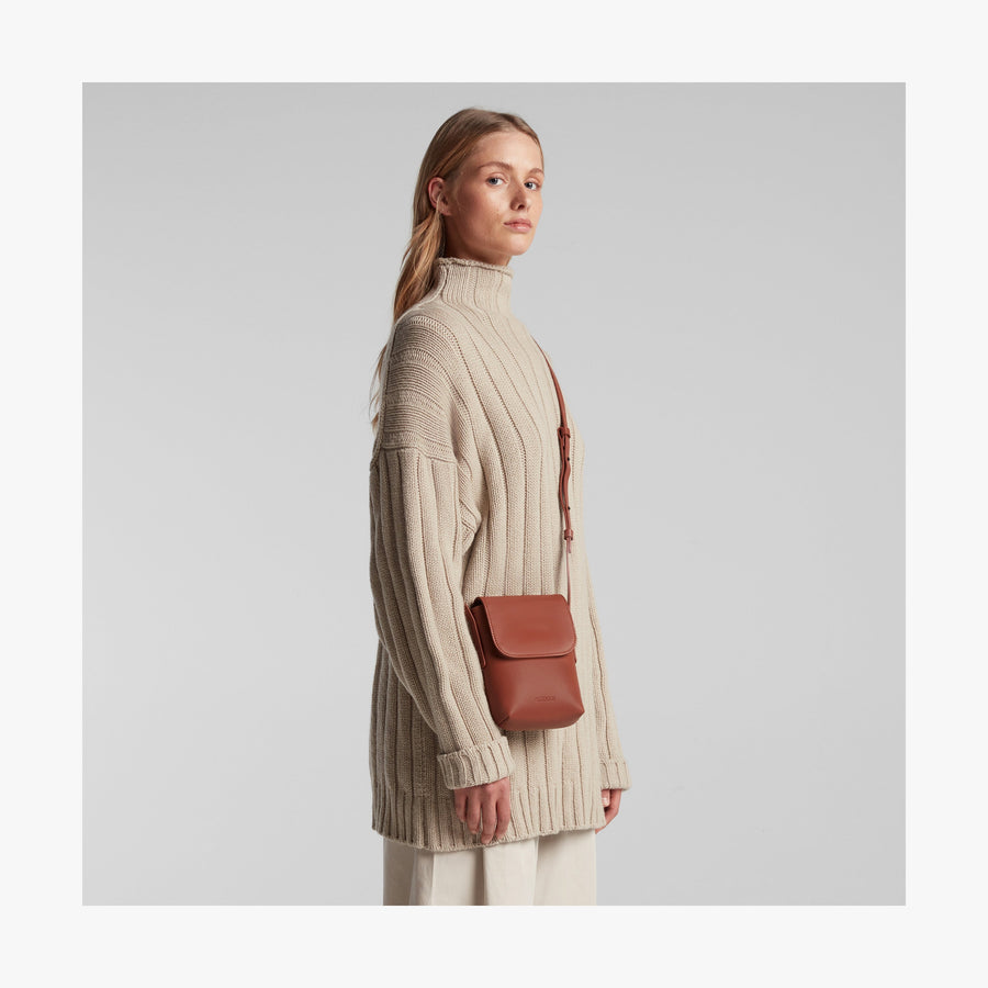 Mahogany (Vegan Leather) | Angled view of Metro Mini Crossbody in Mahogany