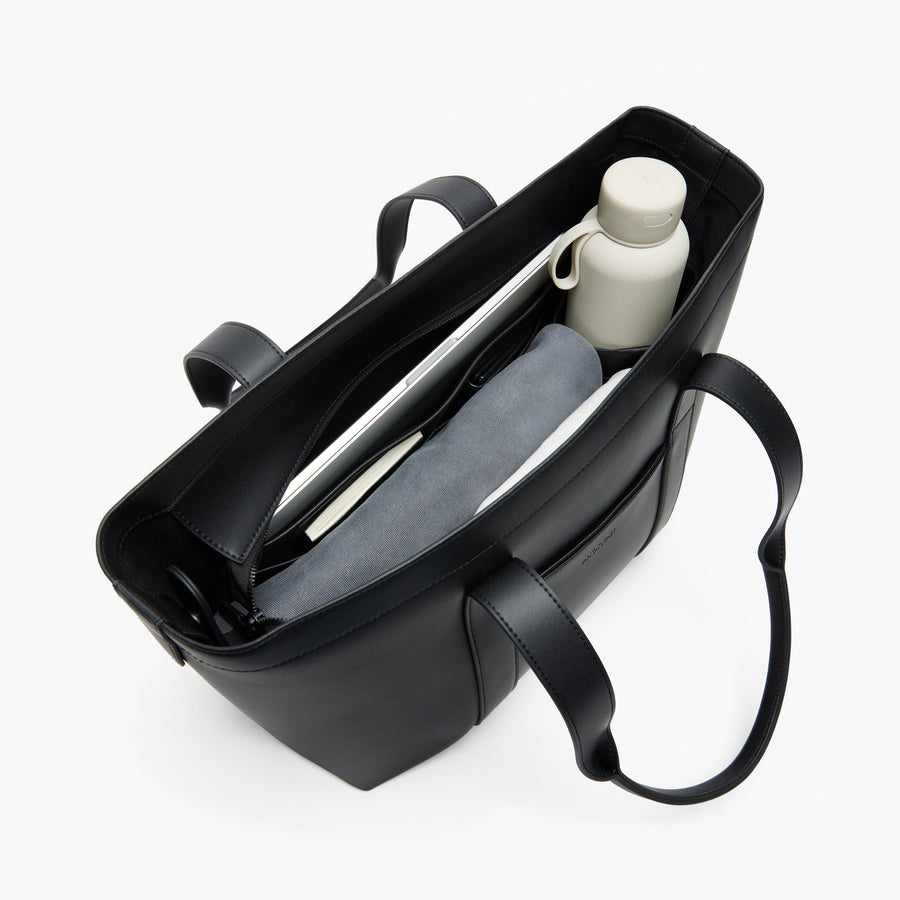 Carbon Black (Vegan Leather) | Angled view of Metro Tote in Carbon Black