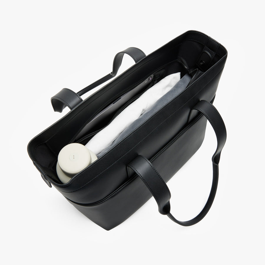 Carbon Black (Vegan Leather) | Angled view of Metro Tote in Carbon Black