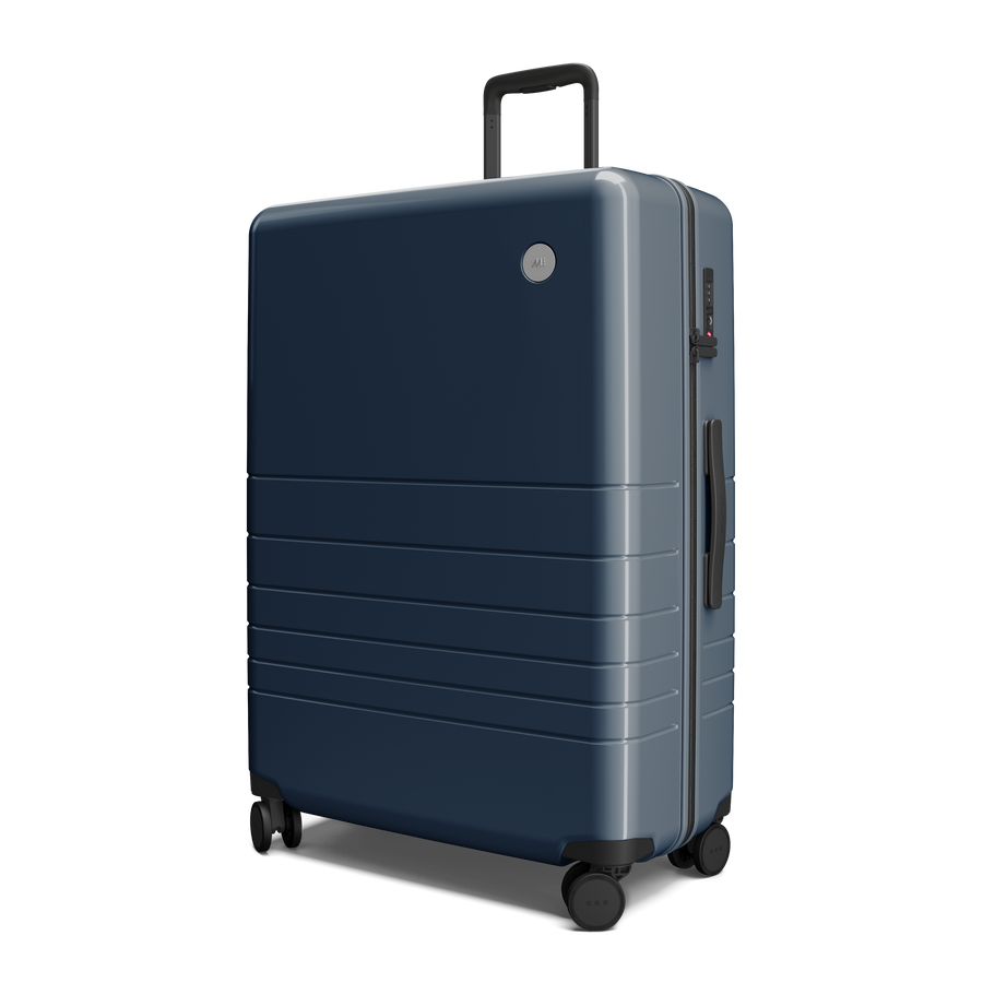 Arles Blue (Glossy) Hover | Angled view of Check-In Large in Arles Blue