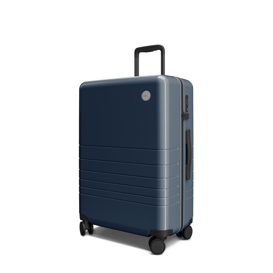 Arles Blue (Glossy) Hover | Angled view of Check-In Medium in Arles Blue